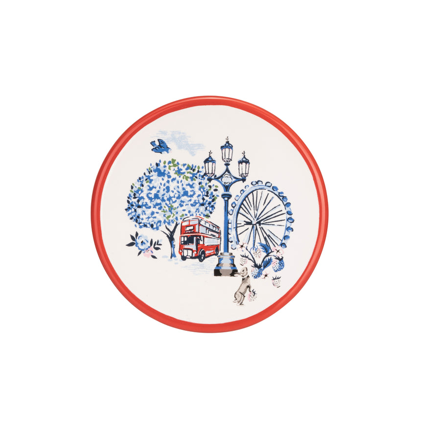 Decorative plate with London-themed design including a double-decker bus, Ferris wheel, and trees.