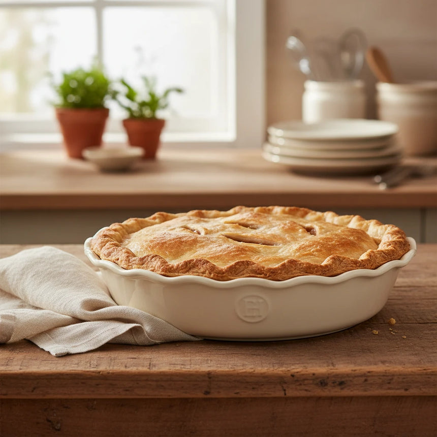 White ceramic pie dish on a white background