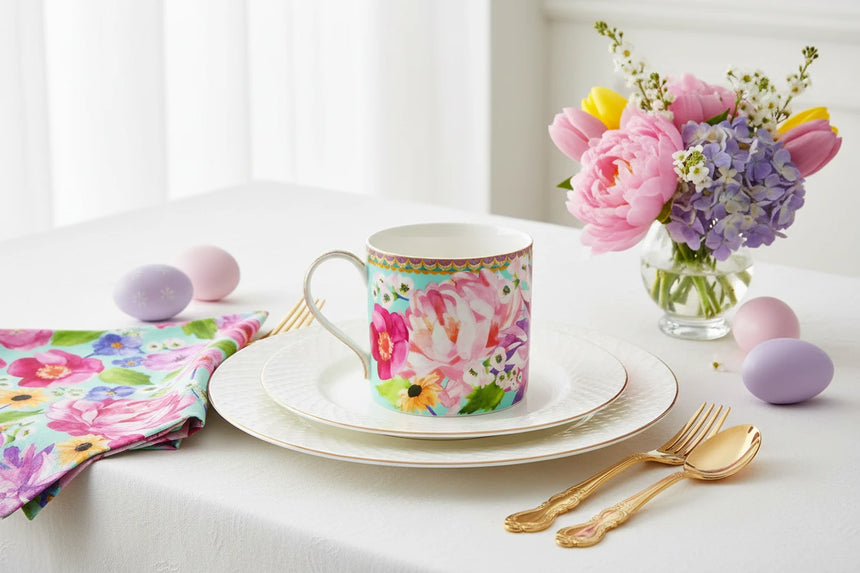 Colorful floral mug with a decorative rim on a white background