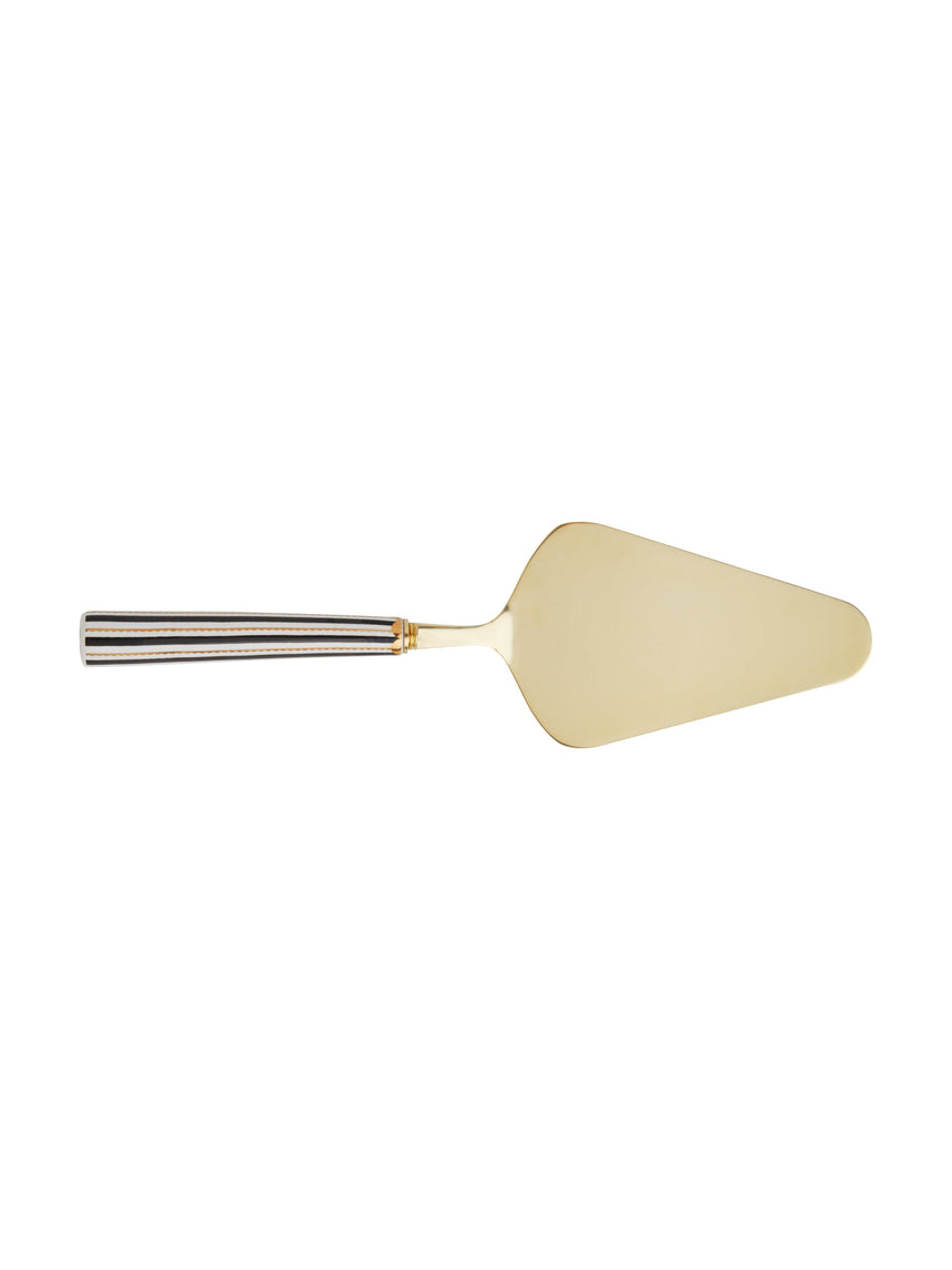 Gold cake server on a white background