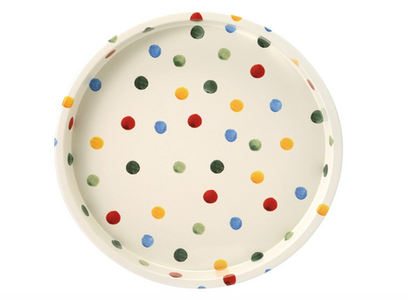 metal serving tray with multicolored polka dot pattern on a white background