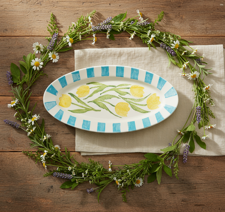Decorative plate with tulip design and blue stripes on a white background