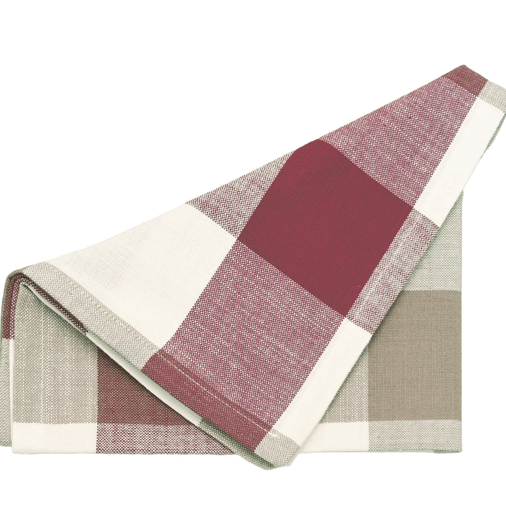 Folded checkered fabric napkin with red, white, and beige pattern on a white background