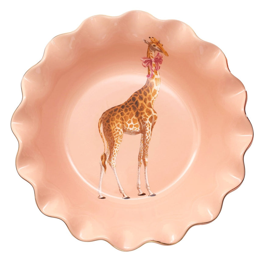 Decorative bowl with a giraffe design on a pink background
