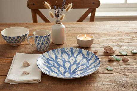 Blue and white patterned plate on a white background