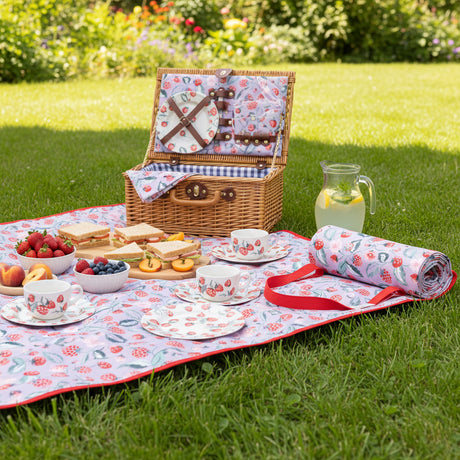 Floral-patterned mat with red straps on a white background