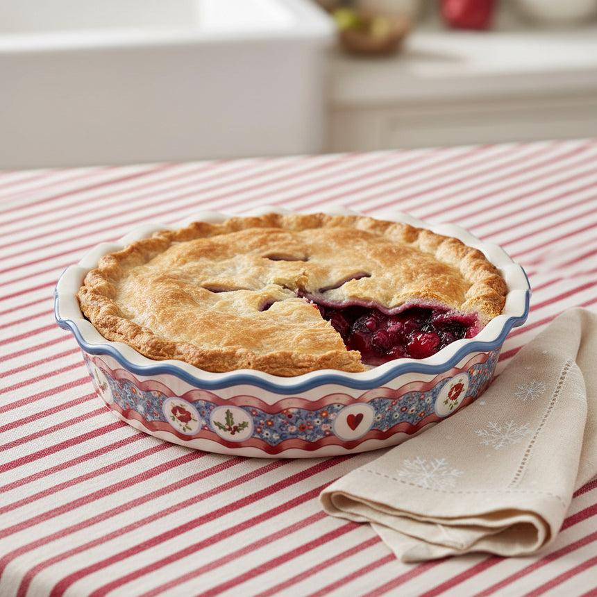 ceramic pie dish with a colorful pattern on a white background