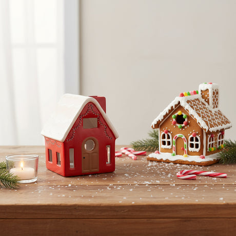Red tealight holder  with white  roof on a white background
