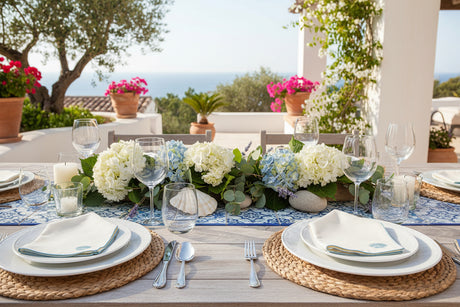 Beige towel with a blue shell design on a white background