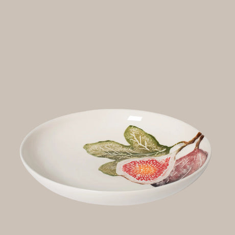 White ceramic plate with fig design on a white background