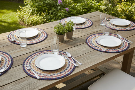 Round braided  placemats with multicolor pattern on a white background