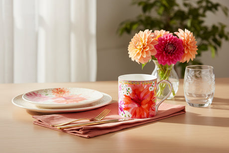 Colorful floral mug on a white background