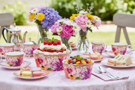 Set of two floral-patterned bowls with a colorful border on a white background