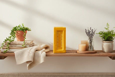 Yellow rectangular vase with 'Outwood Brick Works Manchester' text on a white background