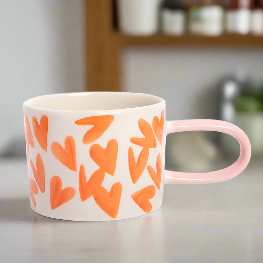 Caroline Gardner Ceramic Mug, Orange Hearts