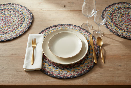 Round braided placemats with multicolor pattern on a white background