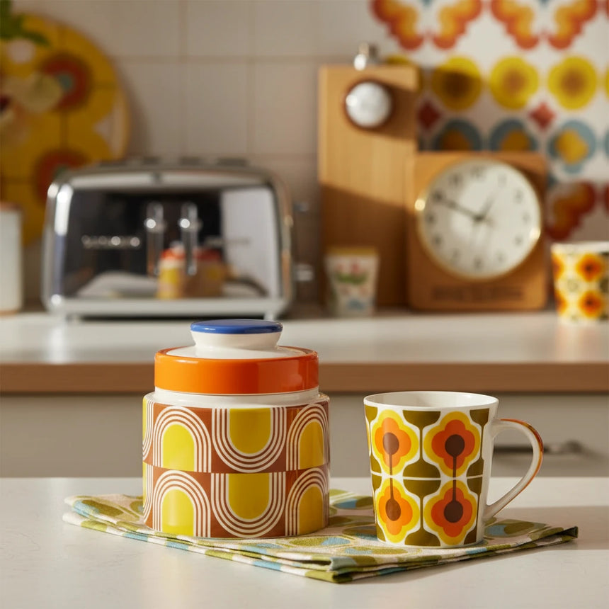 Decorative jar with a geometric pattern on a beige background