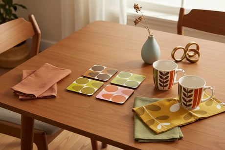 Set of four geometric patterned coasters on a beige background