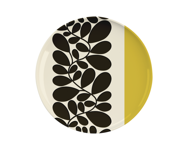 Round plate with black leaf pattern on a white background