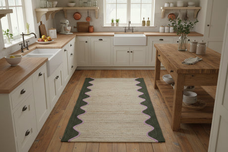 Woven rug with wavy pattern on a white background