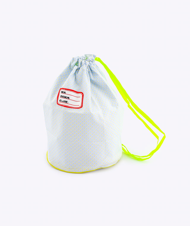 Light blue  drawstring bag with a red label on a white background