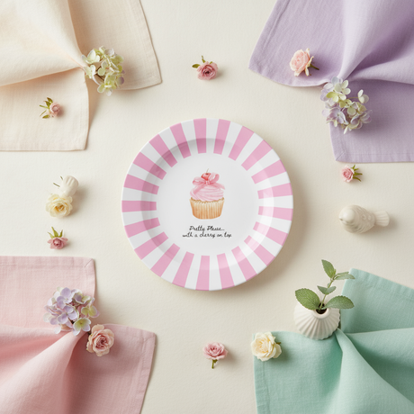 Decorative plate with pink and white striped border and cupcake illustration