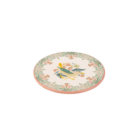 A round ceramic trivet  with a cream-colored background, featuring a central illustration of a green bird with yellow accents and a floral border in green, pink, and orange.