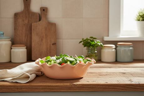 Ceramic bowl with wavy edge on a white background
