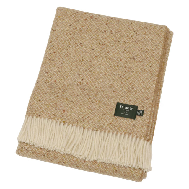 Beige woven blanket with a Bronte label on a white background